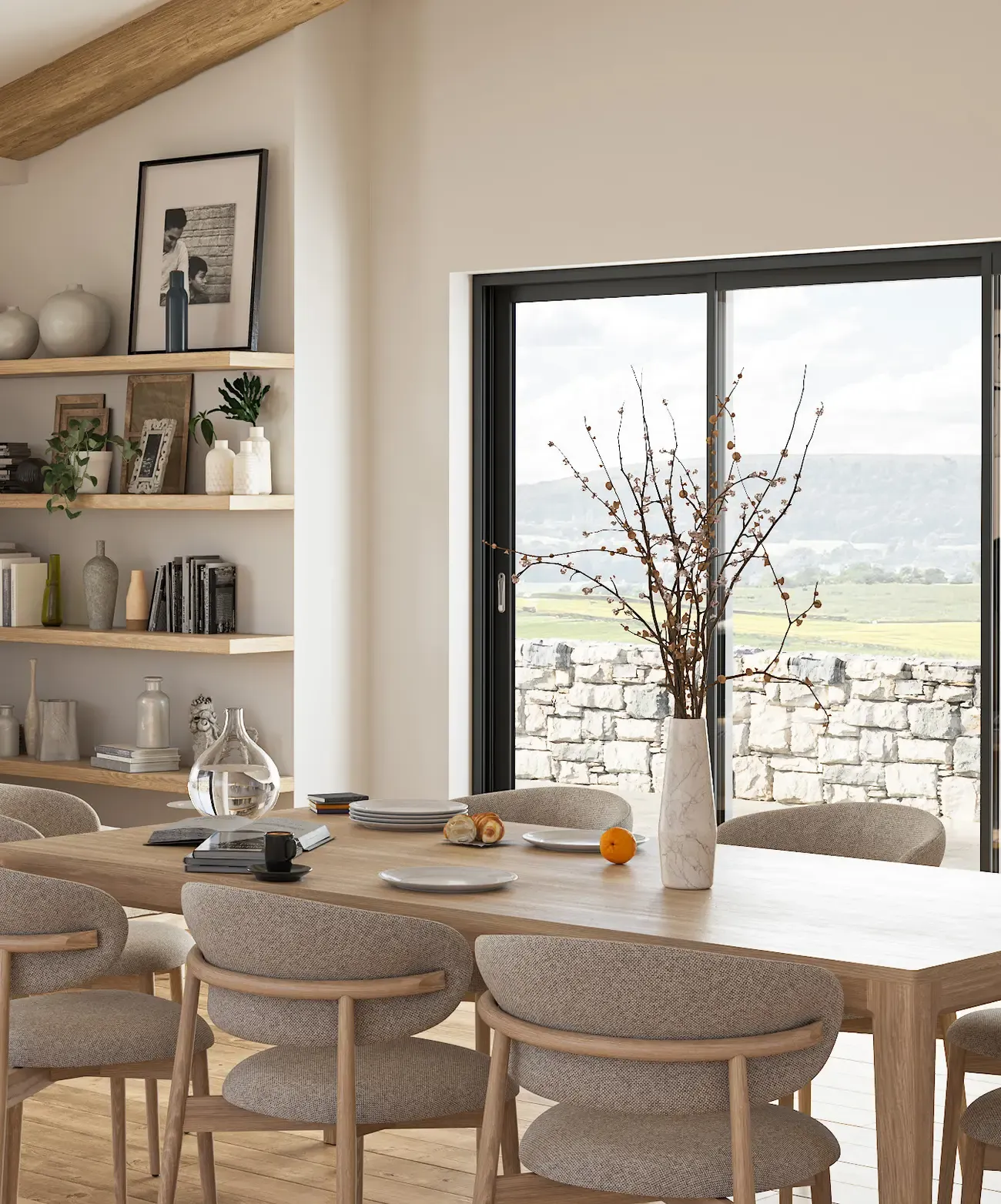 Salle à manger ouvrant sur la campagne par un grand coulissant aluminium Lumine 65