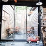 Coulissant SOLEAL55 3 vantaux avec montant central finition inx