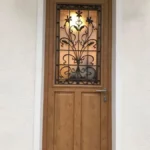 Porte d'entrée, modèle Chicorée 2, reprise de l'ancienne grille, chêne doré, gamme PERFORM