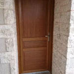 Porte d'entrée, modèle Iris, panneau plein, chêne doré, gamme PERFORM