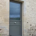 Porte d'entrée, modèle Iris, panneau vitré, bouton inox, gamme HYBRIDE