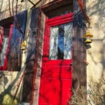 Porte d'entrée, modèle Anémone, grille Vulcain, imposte, gamme TEXTURAL®